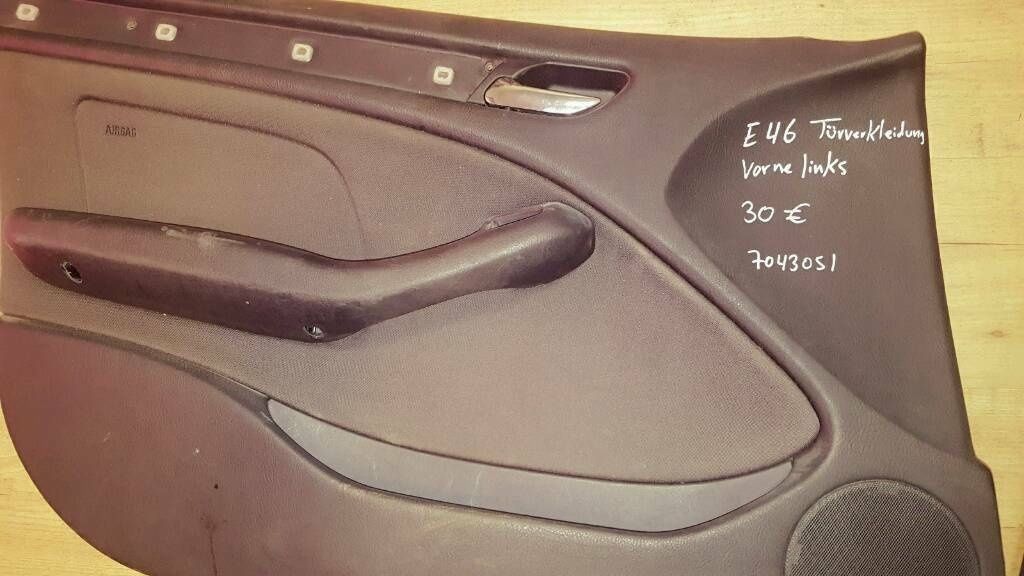 an original BMW E46 sedan/touring door panel, anthracite