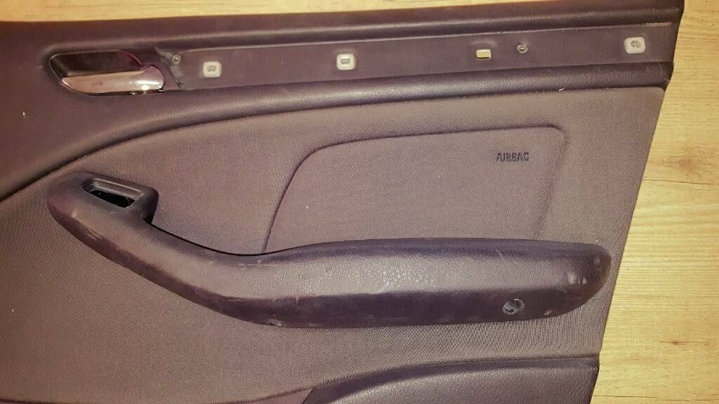 an original BMW E46 sedan/touring door panel, anthracite