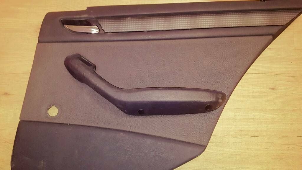 an original BMW E46 sedan/touring door panel, anthracite