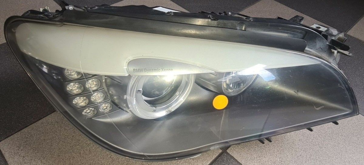 BMW original F01 F02 headlight with cornering light on the right