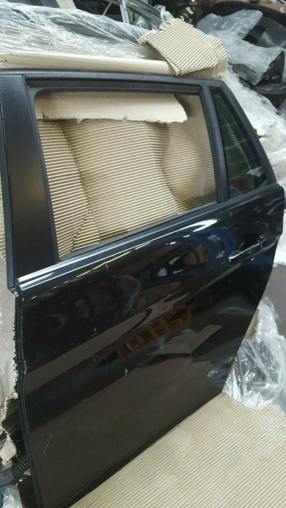 BMW original X3 E83 rear left door in black complete