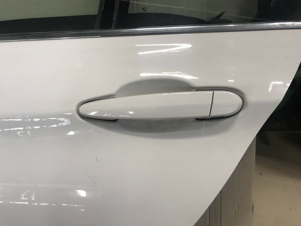 BMW original F35 rear L door in white, completely in top condition.