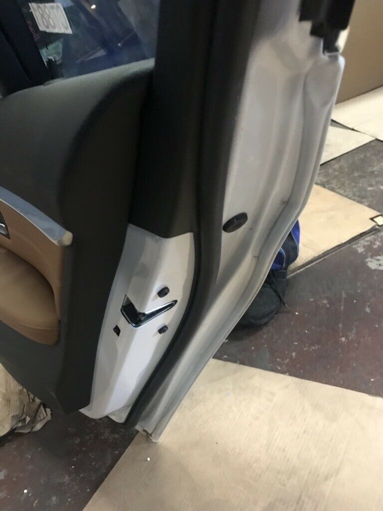 BMW original F35 rear L door in white, completely in top condition.