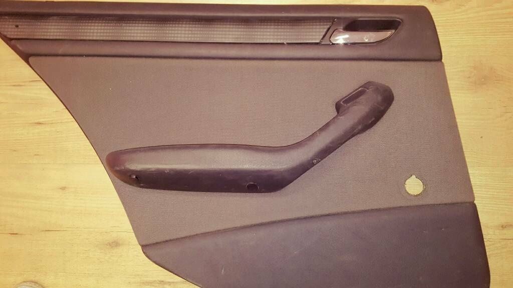 an original BMW E46 sedan/touring door panel, anthracite